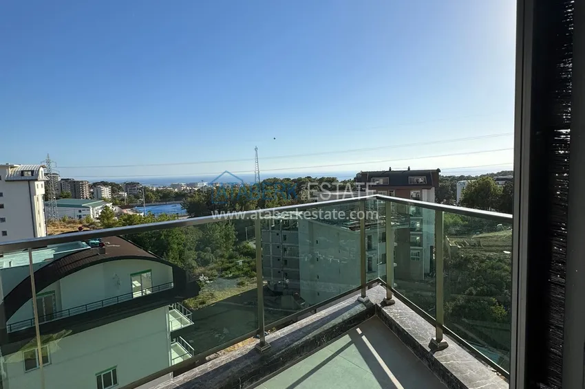 Приобрести Квартира 2+1 с мебелью и частичным видом на море, район Авсаллар – Алания 8 