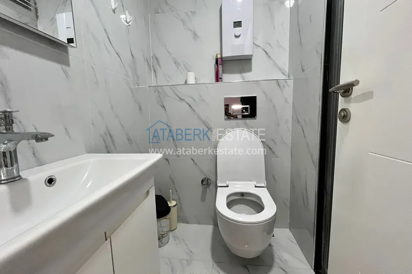 Приобрести Квартира 1+1 меблированная с видом на море, район Каргыджак – Алания 9