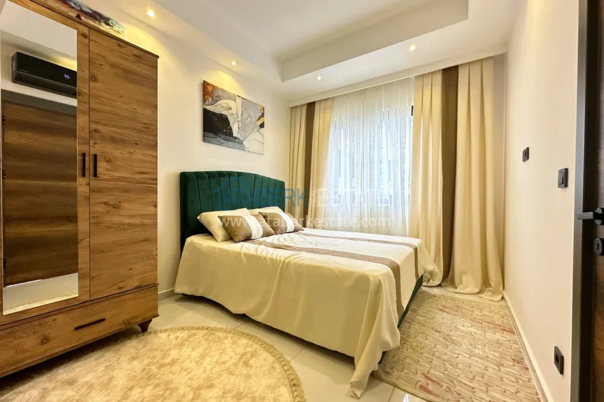 Приобрести Меблированная квартира в Махмутларе в комплексе с отельной инфраструктурой 9