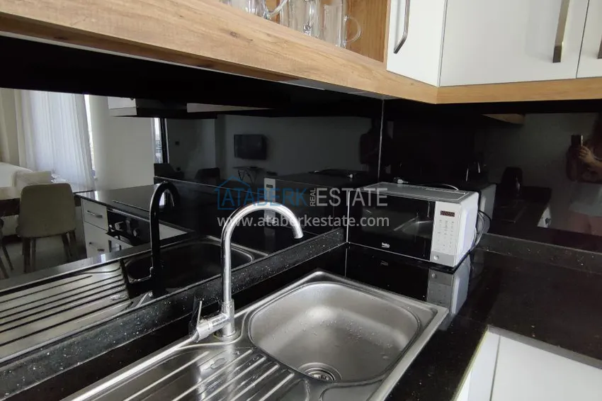 Приобрести Двухкомнатная квартира с видом на море и горы, район Махмутлар – Алания 9 