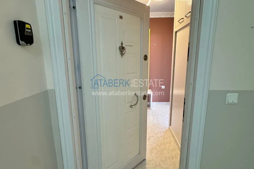 Приобрести Квартира в Махмутларе частично меблированная с застекленным балконом и видом на море 1 