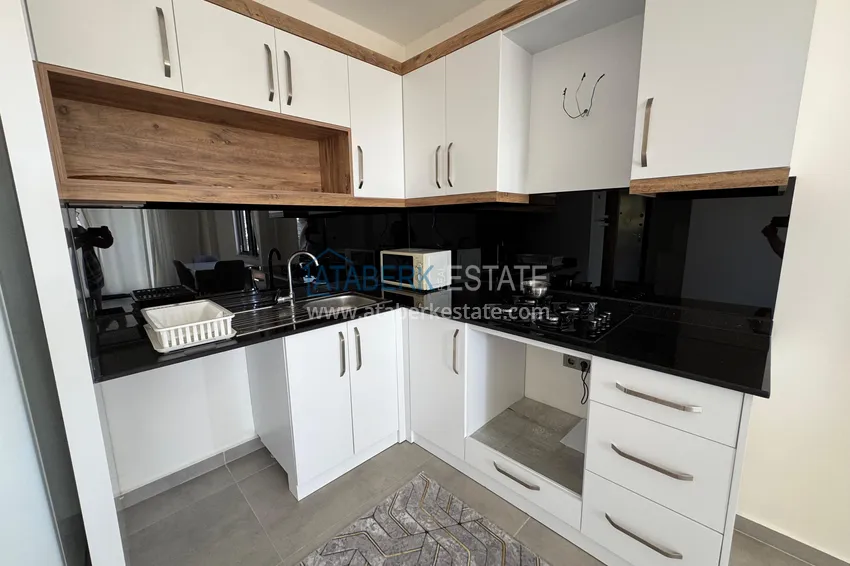 Приобрести Двухкомнатная квартира с видом на море и горы, район Махмутлар – Алания 10 