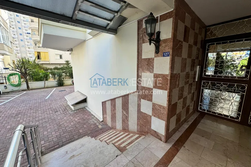 Квартира в Махмутларе частично меблированная с застекленным балконом и видом на море 11 