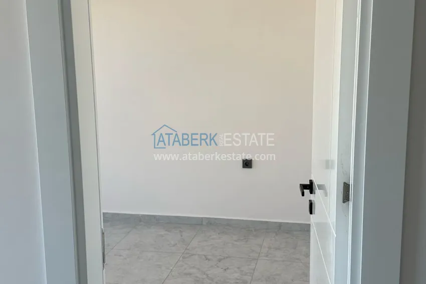 Приобрести Двухкомнатная квартира с видом на море в новом комплексе – Алания, район Авсаллар 10 