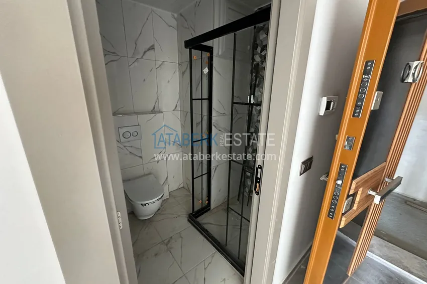 Приобрести Квартира 1+1 с видом на море в Мерсине – Арпачбахшиш, в комплексе на этапе завершения 11 