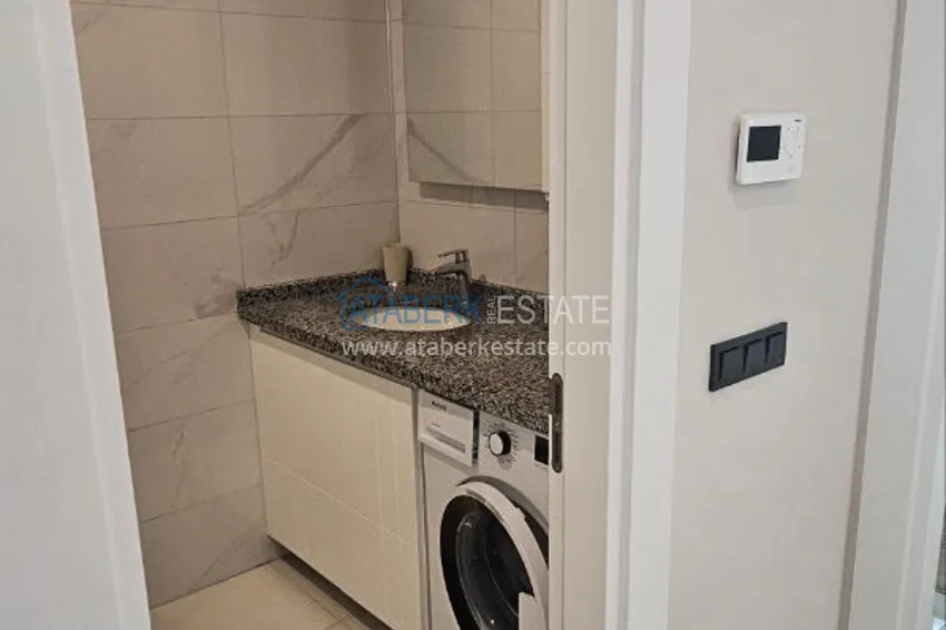 Приобрести Квартира 1+1 с мебелью в 300 метрах от моря, район Махмутлар – Алания 11 