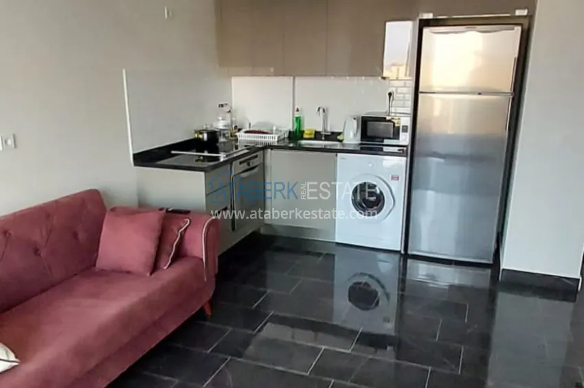 Приобрести Квартира 1+1 с мебелью и видом на море в новом комплексе - район Махмутлар, Алания 11