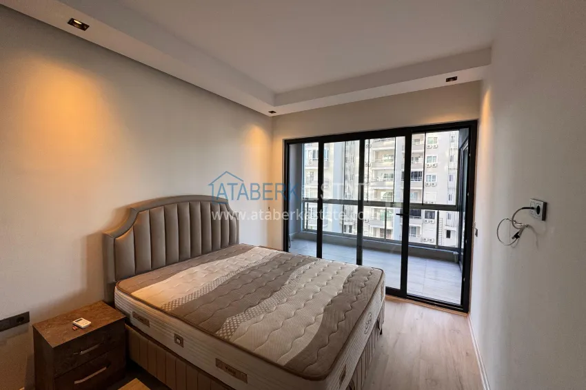 Приобрести Двухкомнатная квартира с мебелью и застекленным балконом в районе Махмутлар, Алания 13