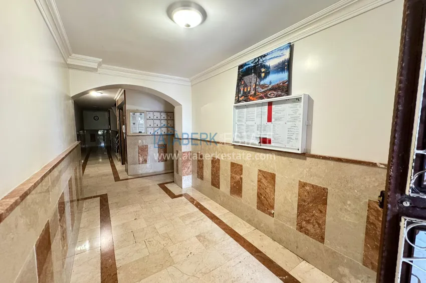 Квартира в Махмутларе частично меблированная с застекленным балконом и видом на море 13 