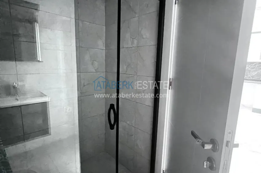 Приобрести Двухкомнатная квартира в новом комплексе комфорт-класса в районе Демирташ, Алания 14