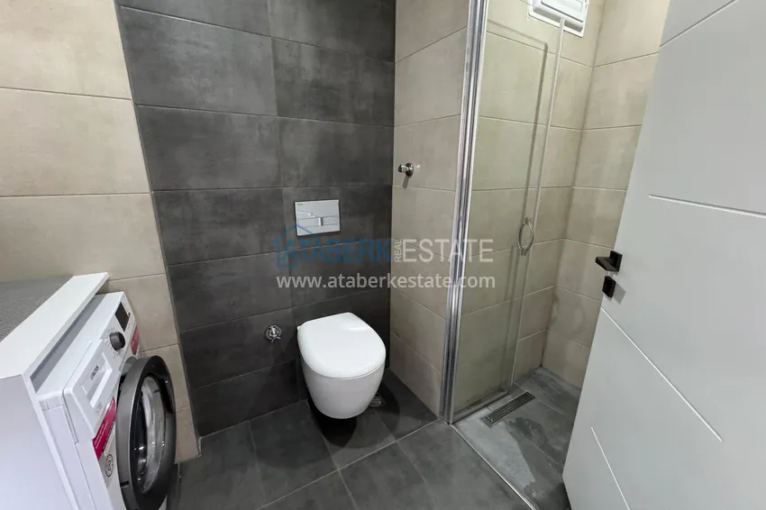 Приобрести Двухкомнатная квартира с видом на море и горы, район Махмутлар – Алания 14 