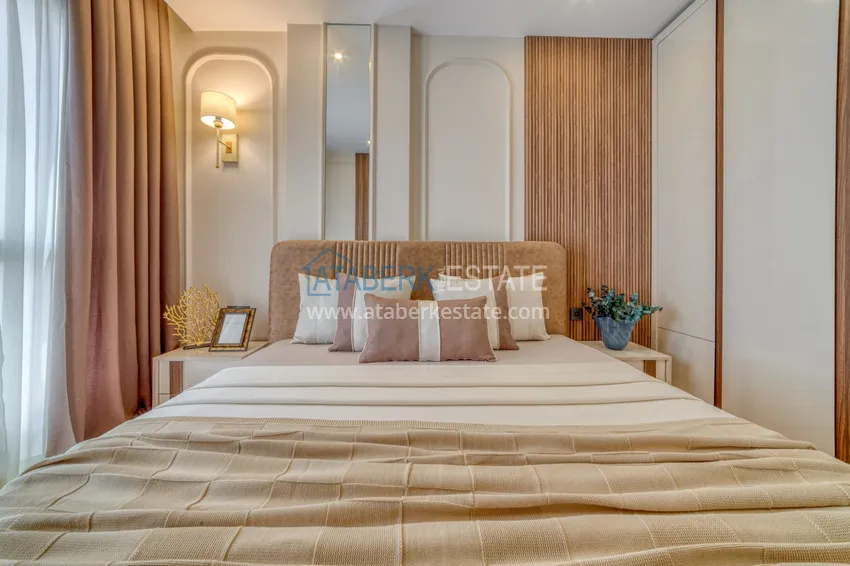 Приобрести Трехкомнатная квартира под ключ в Махмутларе в современном комплексе 14 