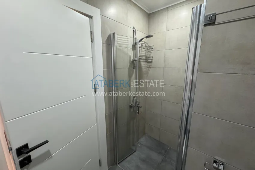 Приобрести Двухкомнатная квартира с мебелью и застекленным балконом в районе Махмутлар, Алания 16