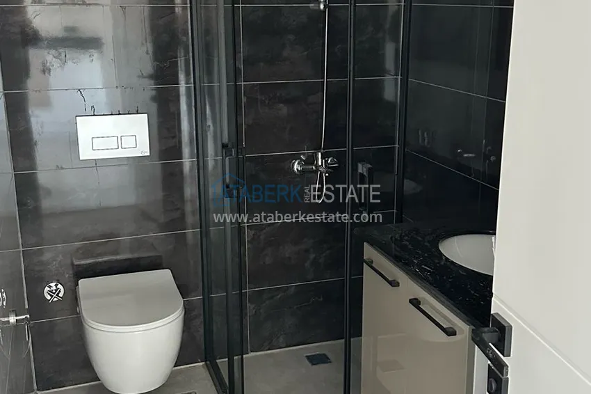 Приобрести Двухкомнатная квартира с видом на море в новом комплексе – Алания, район Авсаллар 13 