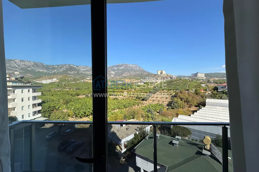 Приобрести Двухкомнатная квартира с видом на море и горы, район Махмутлар – Алания 16 