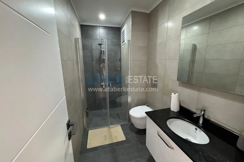 Приобрести Трёхкомнатная квартира с мебелью и видом на горы, район Махмутлар – Алания 17