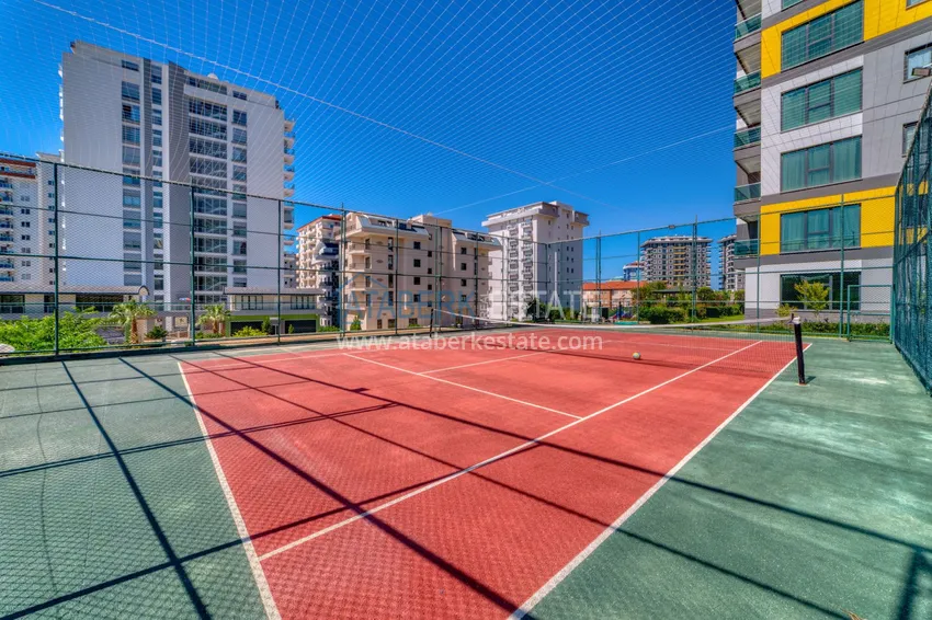 Трехкомнатная квартира под ключ в Махмутларе в современном комплексе 16 