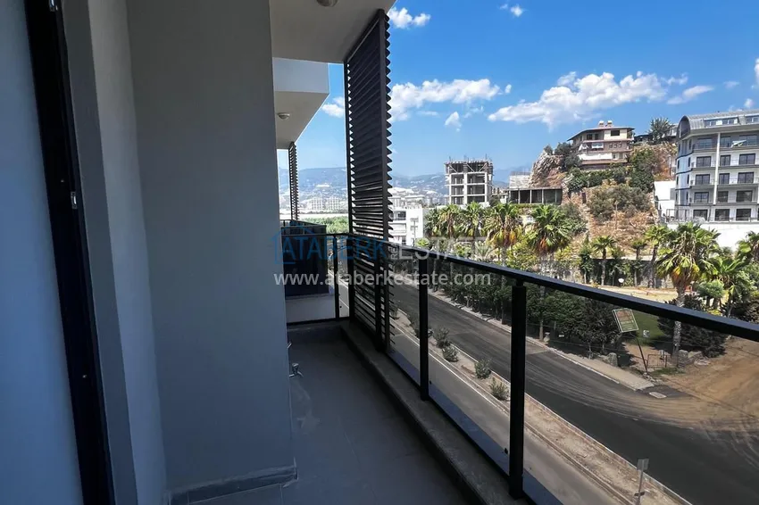 Приобрести Двухкомнатная квартира в новом комплексе комфорт-класса в районе Демирташ, Алания 17