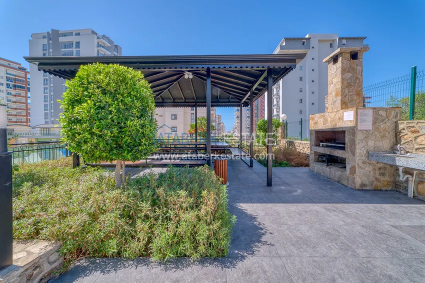 Трехкомнатная квартира под ключ в Махмутларе в современном комплексе 17 