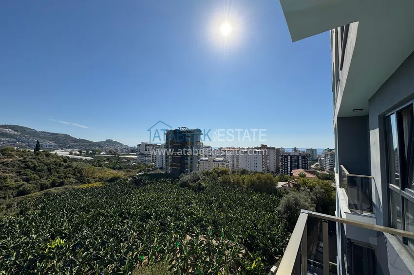 Приобрести Двухкомнатная квартира с видом на море и горы, район Махмутлар – Алания 19 