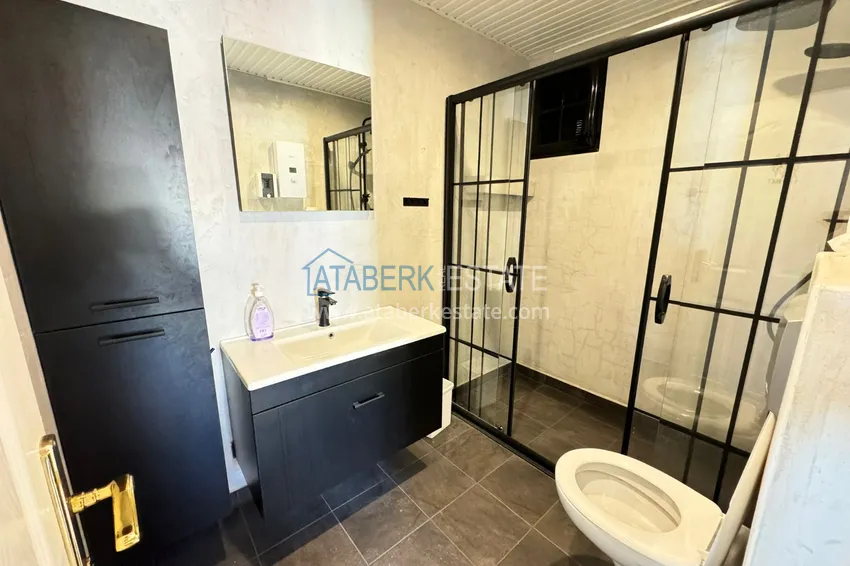 Приобрести Квартира в Махмутларе частично меблированная с застекленным балконом и видом на море 20 