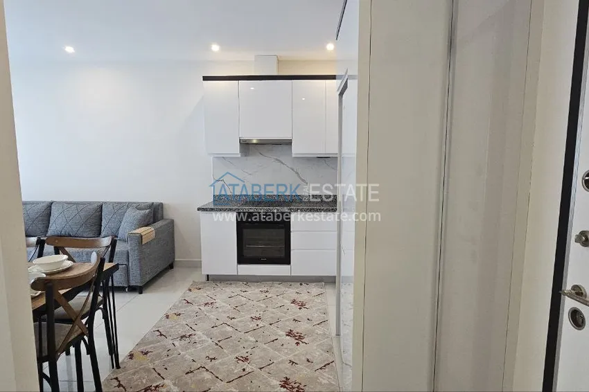 Приобрести Квартира 1+1 с мебелью в 300 метрах от моря, район Махмутлар – Алания 1 