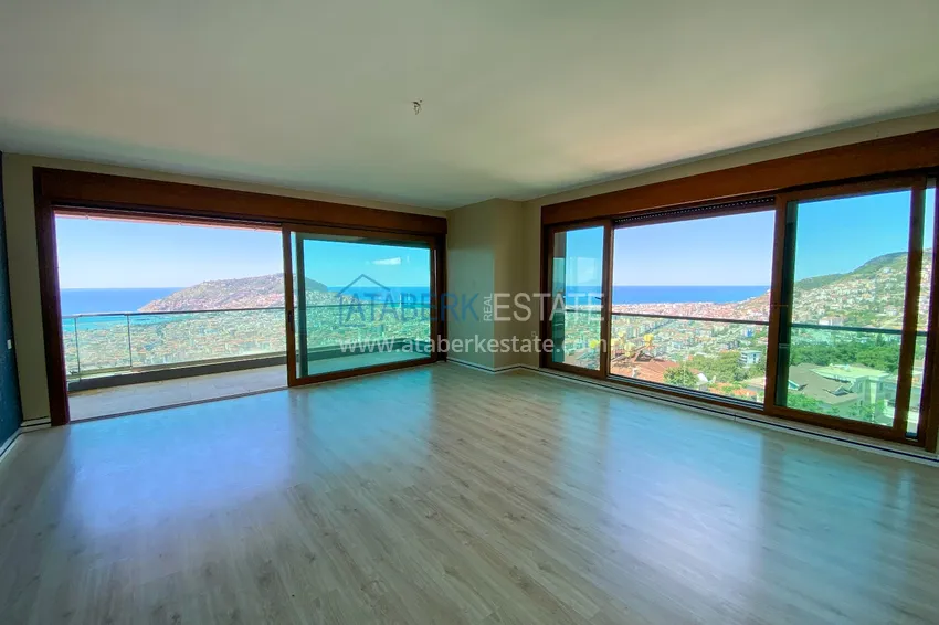 Приобрести Четырехкомнатная линейная квартира с отдельной кухней в центре Алании – Хасбахче 1 