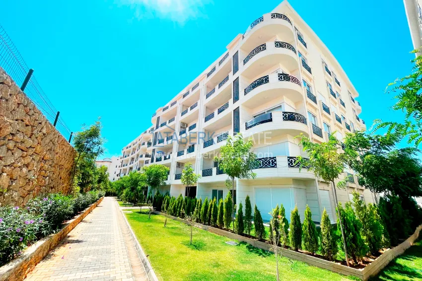 Квартира в районе Оба с качественной чистовой отделкой и открытым видом на горы 1