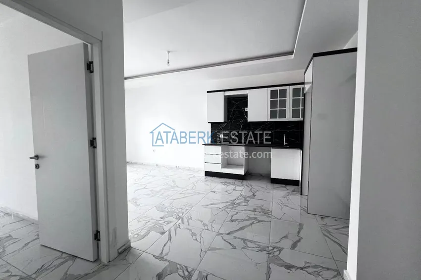 Приобрести Двухкомнатная квартира в новом комплексе комфорт-класса в районе Демирташ, Алания 1