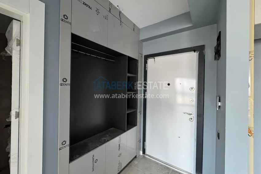 Приобрести Двухкомнатная квартира с чистовой отделкой в Мерсине, район Эрдемли – Арпачбахшиш 1 