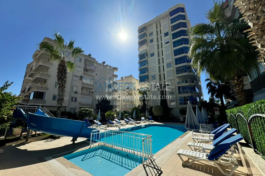 Квартира в Махмутларе частично меблированная с застекленным балконом и видом на море 1 