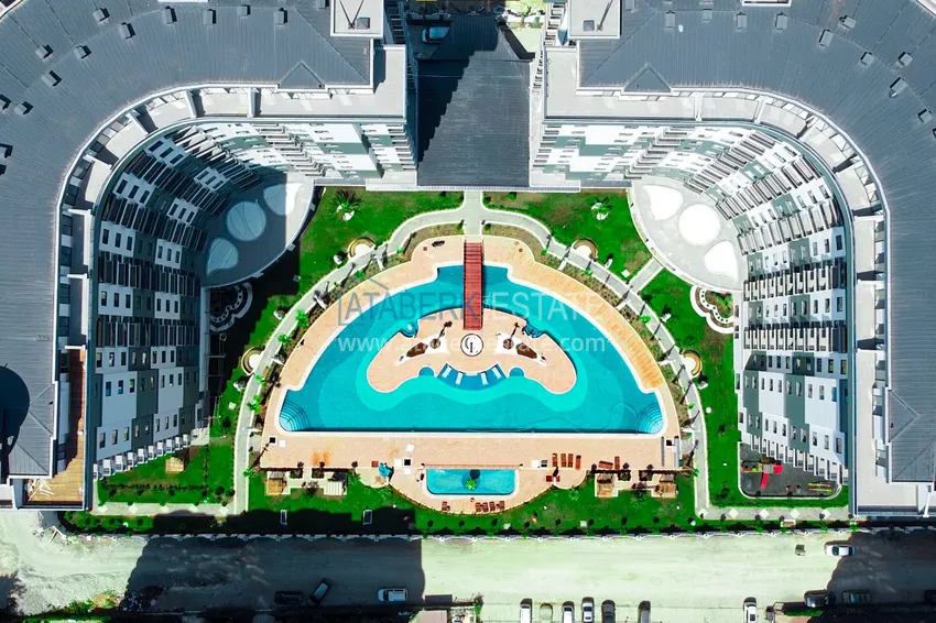 Меблированная двухкомнатная квартира в комплексе с отельной инфраструктурой, район Махмутлар – Алания 3 