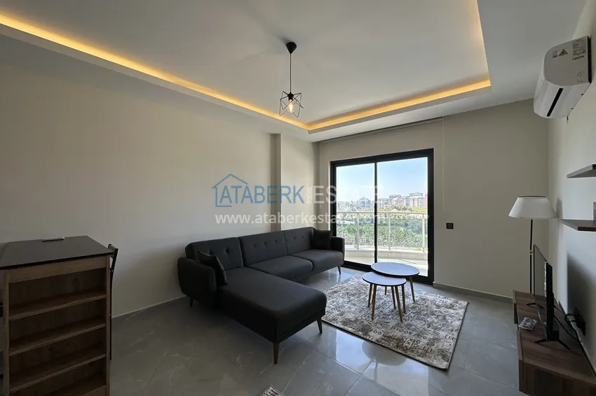 Приобрести Квартира 1+1 с мебелью и видом на море, район Махмутлар – Алания 2 