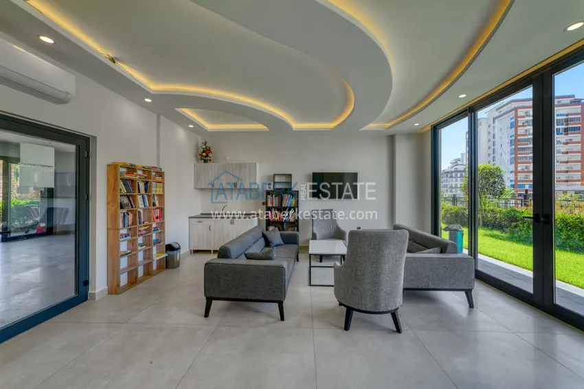 Трехкомнатная квартира под ключ в Махмутларе в современном комплексе 20 