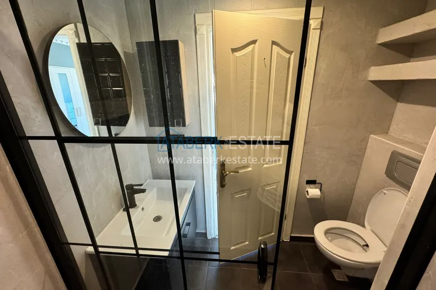 Приобрести Квартира в Махмутларе частично меблированная с застекленным балконом и видом на море 22 