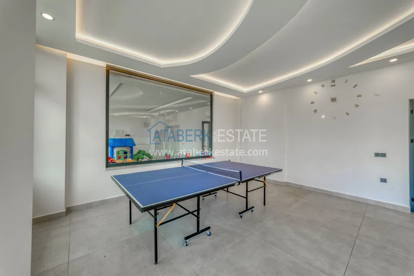 Трехкомнатная квартира под ключ в Махмутларе в современном комплексе 22 