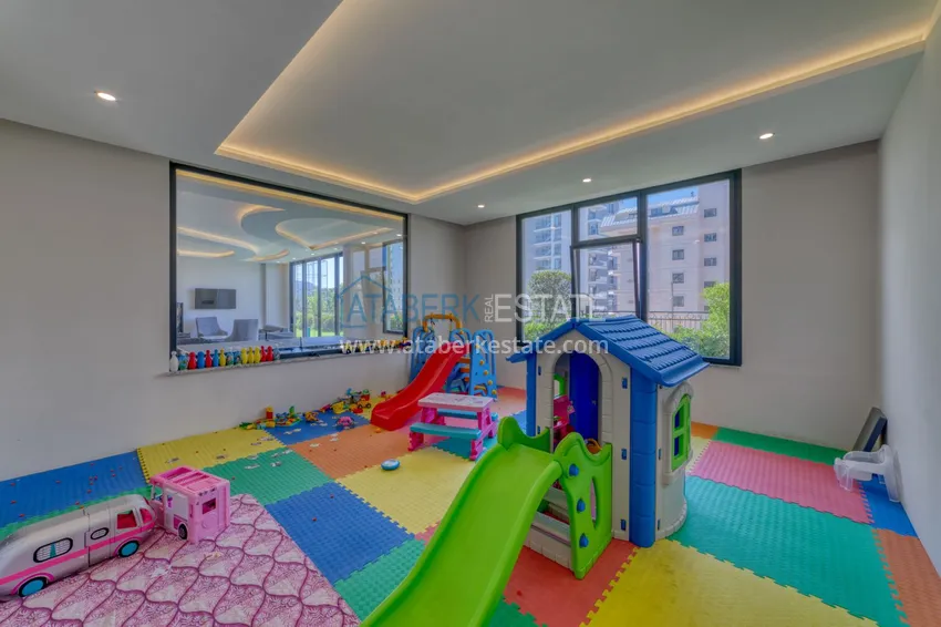 Трехкомнатная квартира под ключ в Махмутларе в современном комплексе 23 