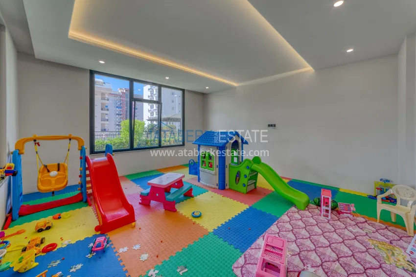 Трехкомнатная квартира под ключ в Махмутларе в современном комплексе 24 