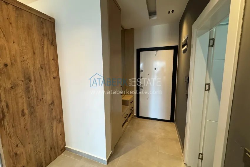 Приобрести Двухкомнатная квартира с мебелью и застекленным балконом в районе Махмутлар, Алания 2