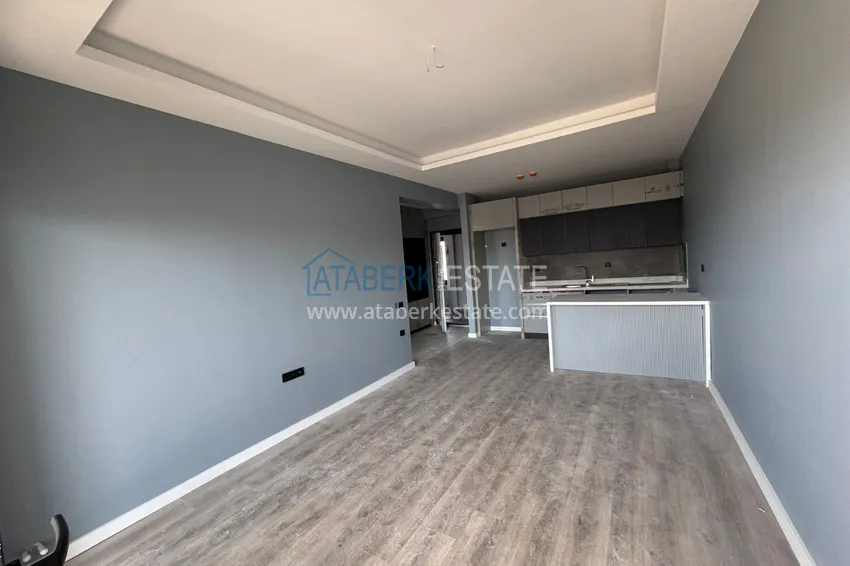 Приобрести Двухкомнатная квартира с чистовой отделкой в Мерсине, район Эрдемли – Арпачбахшиш 2 