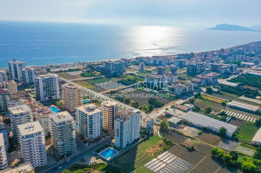 Трехкомнатная квартира с мебелью и отдельной кухней в районе Махмутлар 2 