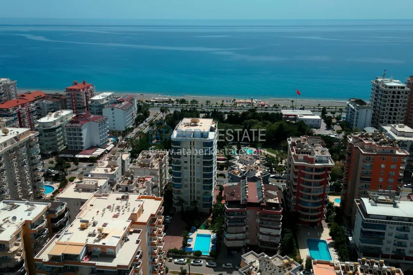 Квартира в Махмутларе частично меблированная с застекленным балконом и видом на море 2 