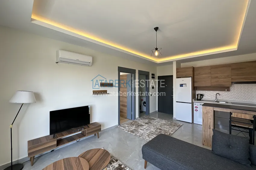 Приобрести Квартира 1+1 с мебелью и видом на море, район Махмутлар – Алания 3 