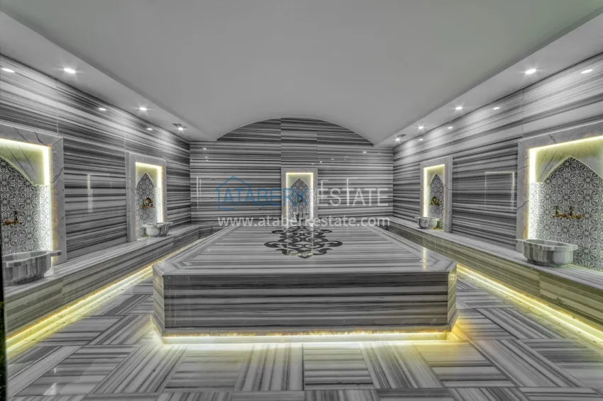 Трехкомнатная квартира под ключ в Махмутларе в современном комплексе 30 