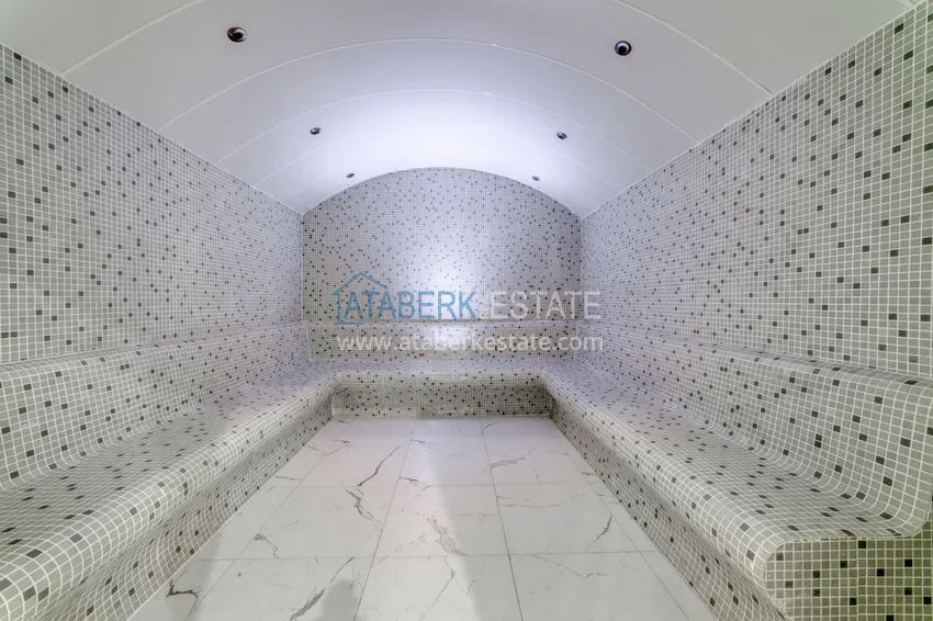 Трехкомнатная квартира под ключ в Махмутларе в современном комплексе 31 