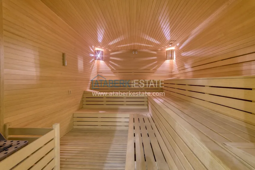 Трехкомнатная квартира под ключ в Махмутларе в современном комплексе 32 