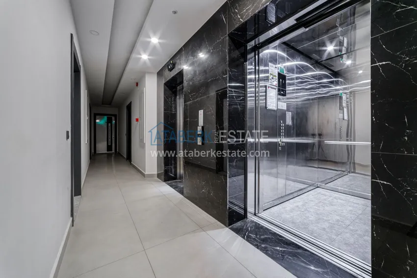 Трехкомнатная квартира под ключ в Махмутларе в современном комплексе 35 