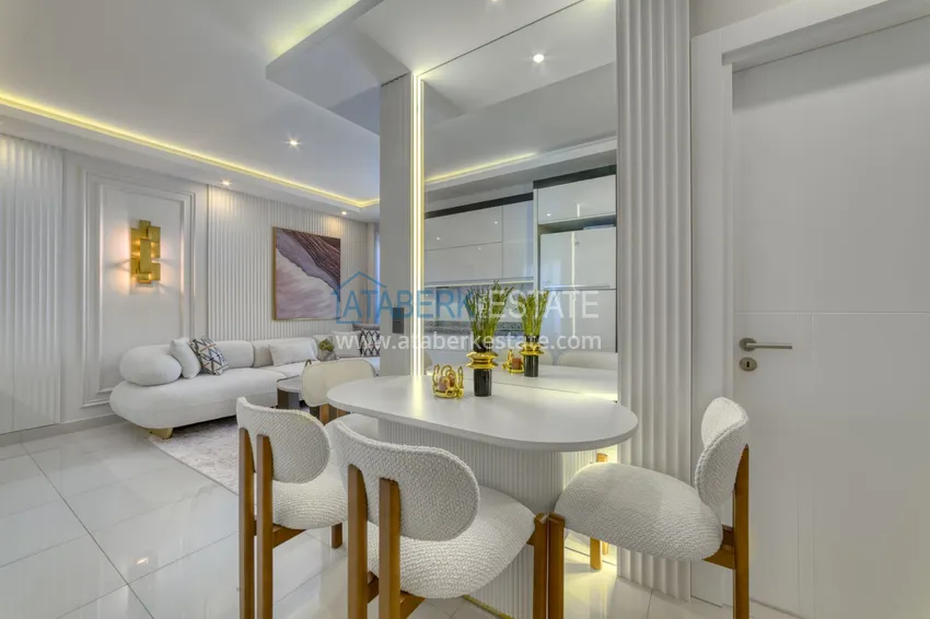 Приобрести Трехкомнатная квартира под ключ в Махмутларе в современном комплексе 3 