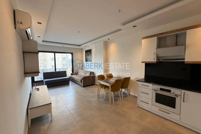 Приобрести Двухкомнатная квартира с мебелью и застекленным балконом в районе Махмутлар, Алания 3