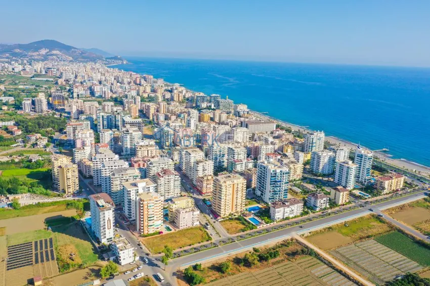 Трехкомнатная квартира с мебелью и отдельной кухней в районе Махмутлар 3 